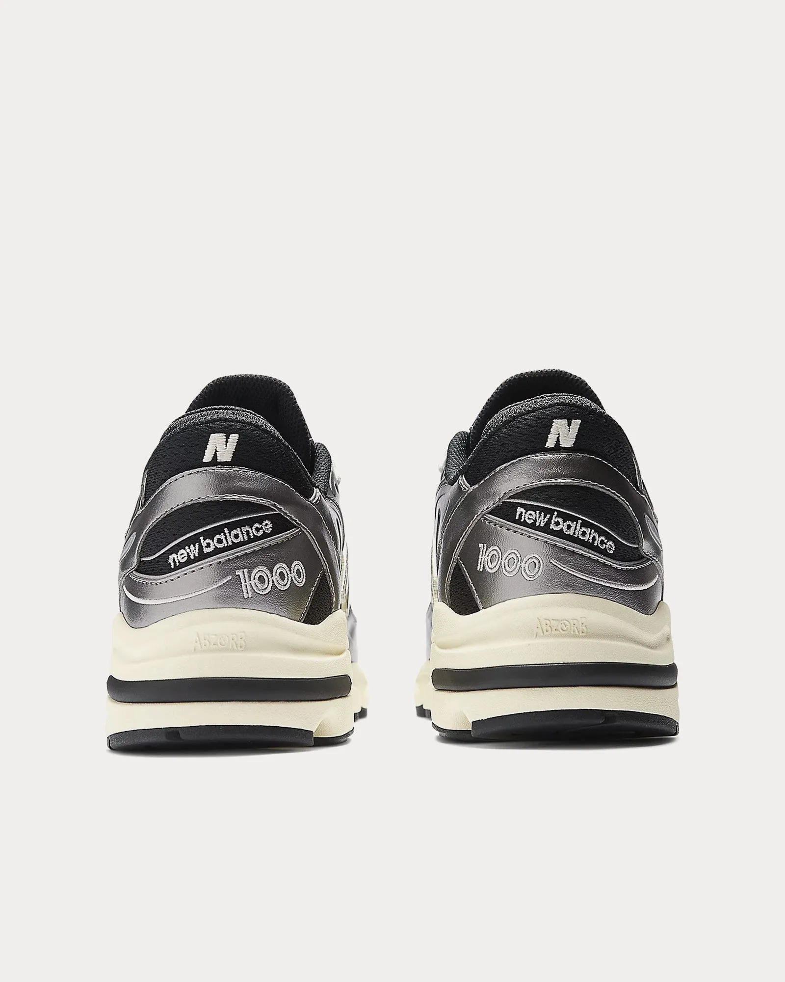 1000 Silver Metallic / Black/ Dawn Glow Low Top Sneakers